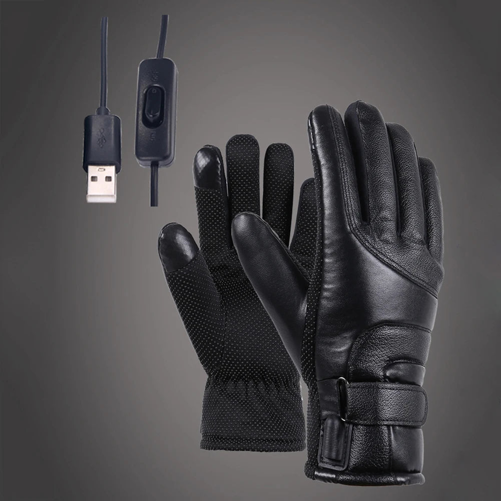 Black heated gloves with USB cable and power adapter on a gray background
